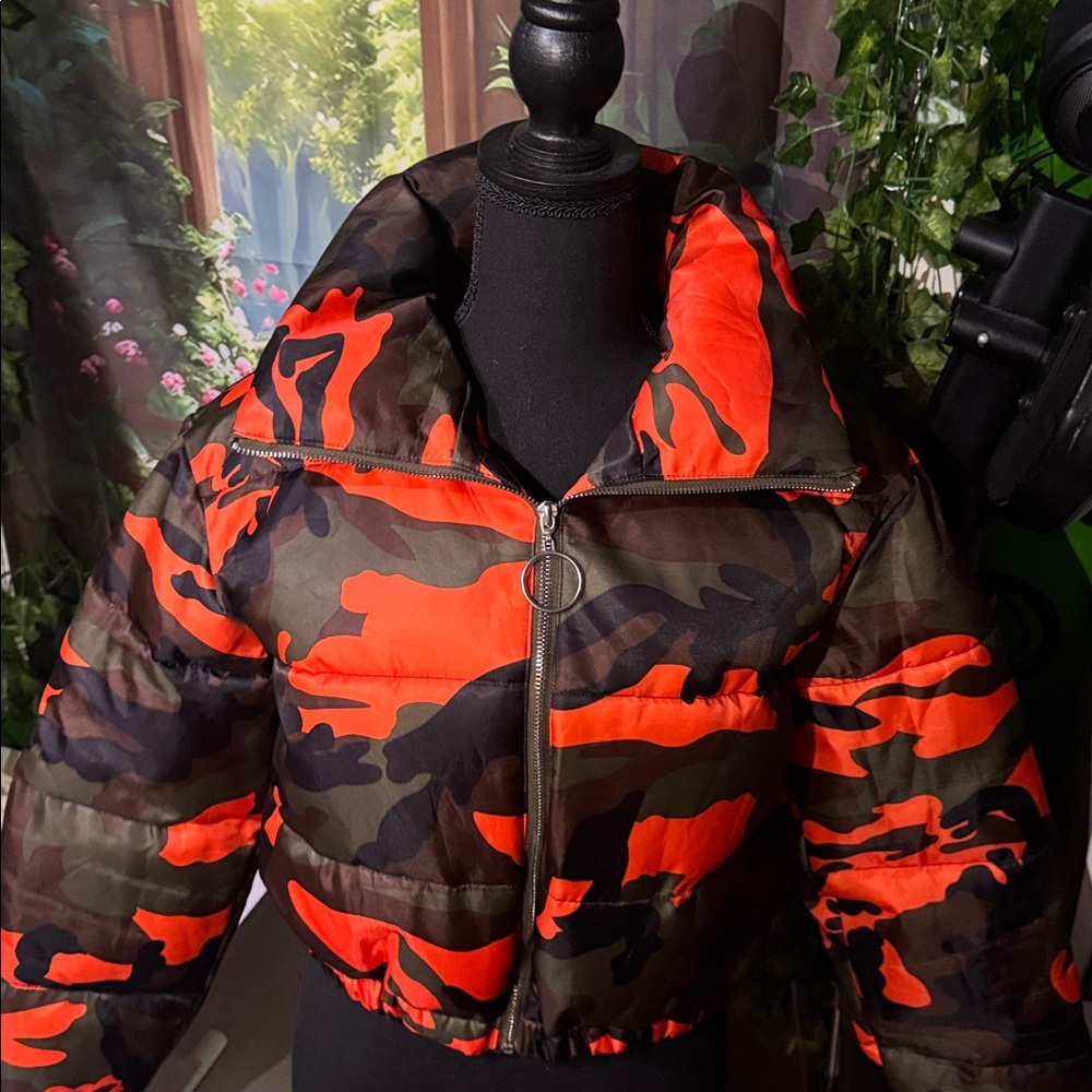 Camouflage Puffer Jacket with Orange Accents